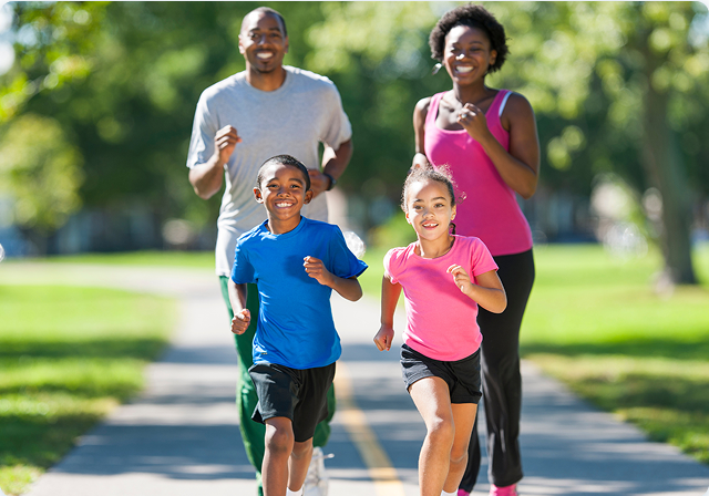 Family running together outdoors